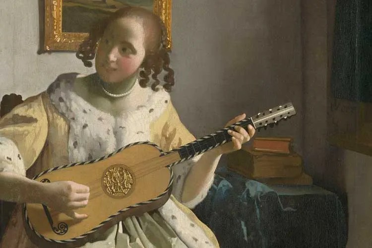 Painting, "The Guitar Player" by Johannes Vermeer, 1672, featuring a baroque guitar.