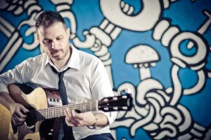 Alberto Lombardi playing guitar