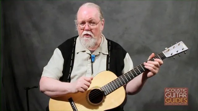 Orville Johnson with his guitar