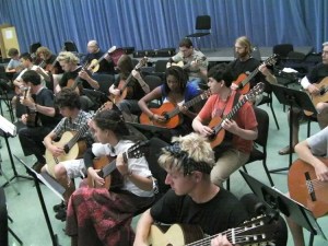 A guitar workshop at the Guitar Foundtion of America's Summit Orchestra for kids