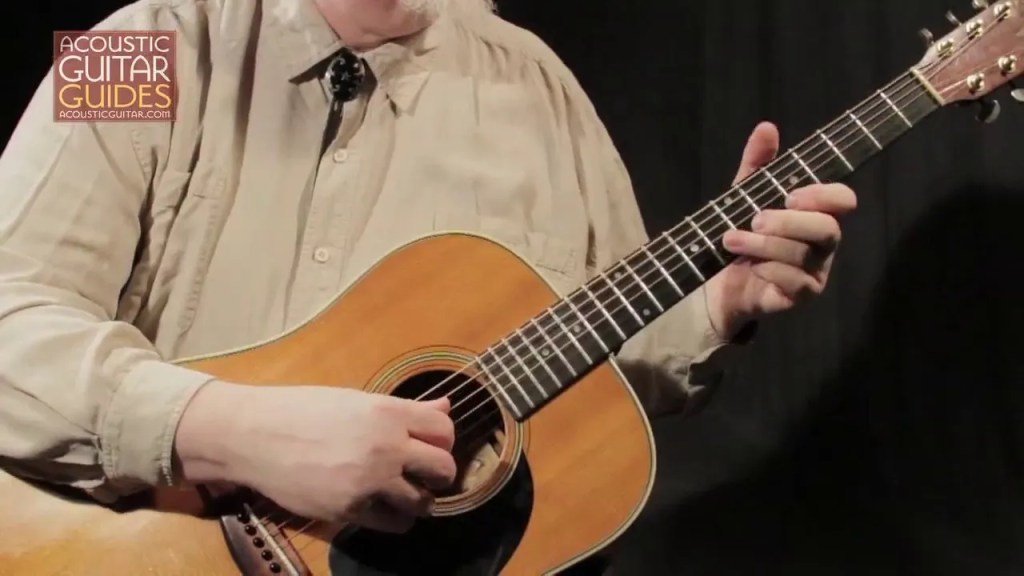 Orville Johnson playing Oh Daddy on guitar