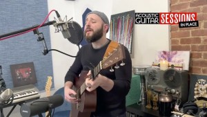 screenshot of singer-songwriter Thin Lear performing in his home studio