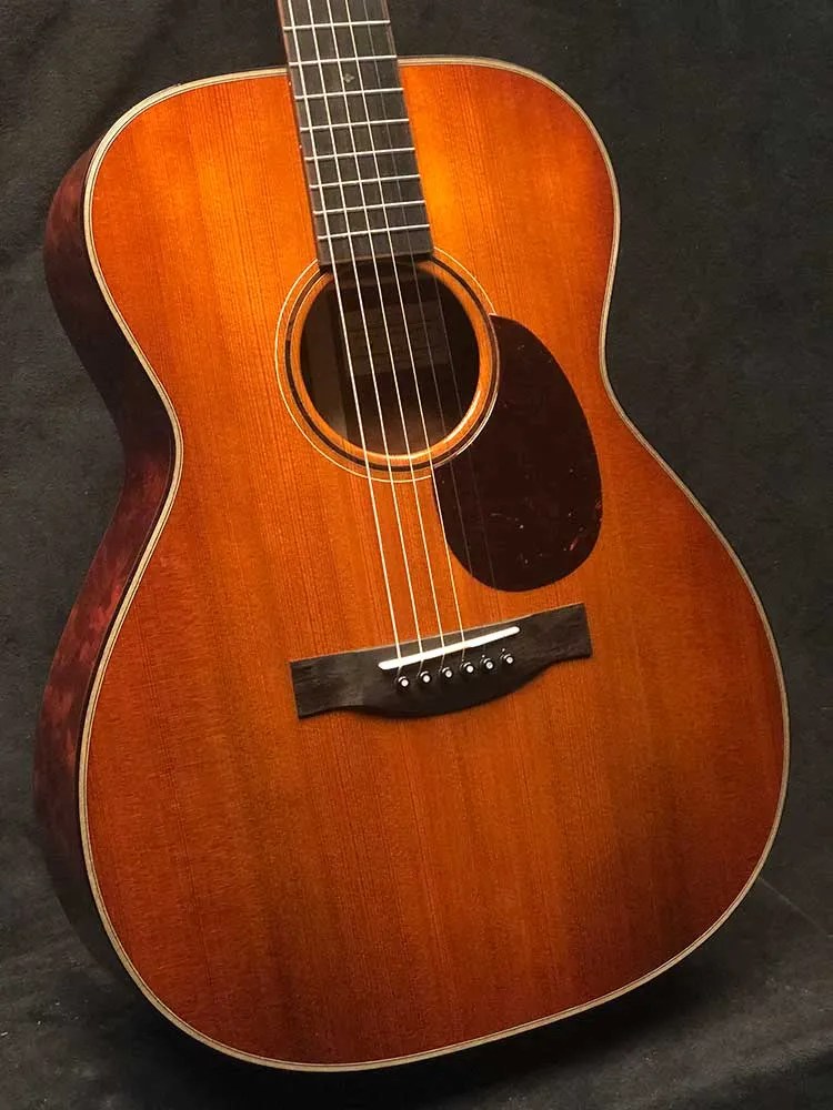 Body of a 2021 Santa Cruz OM Custom acoustic guitar made from Tunnel 13 Redwood